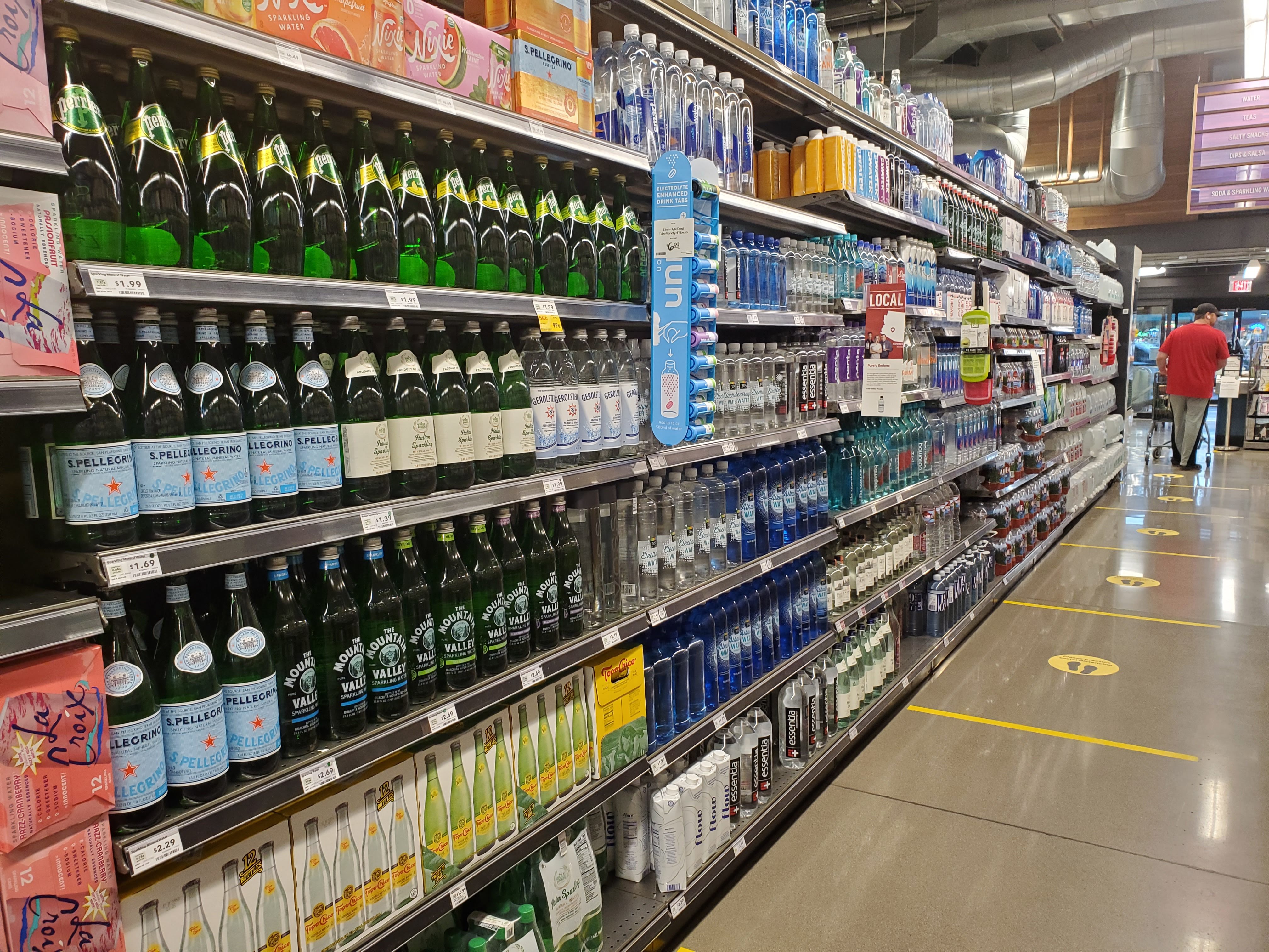 social distancing measures at the whole foods checkout line